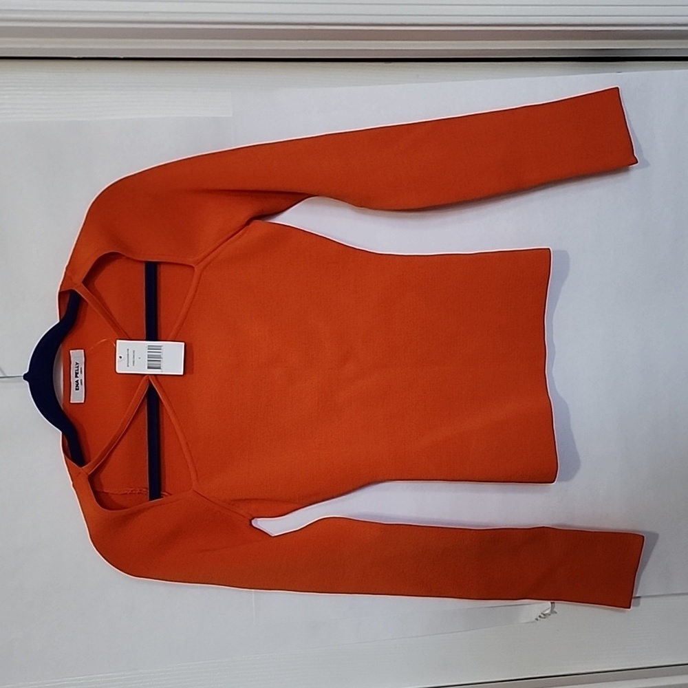 Ena Pelly orange long sleeve sweater. Made with recycled polyester and viscose.